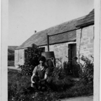 John Dunnet with his dog in the garden at Roseville.